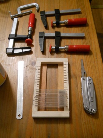The base of the slide tray was put together with scrap wood and the saw on the pocket tool.