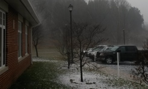 Hailstones banging off the roof of the schoolhouse, and off the cars in the parking lot.