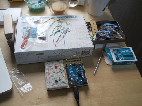 Arduino UNO connected to a breadboard from the starter kit.