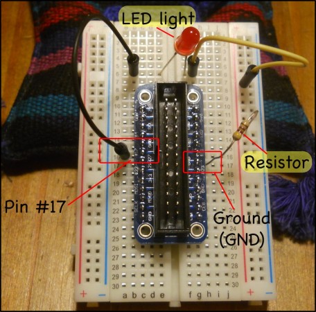 A circuit that connects the #17 GPIO pin to a red LED light then to a resistor before going back into the ground (GND).