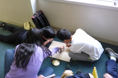 Students playing Go.